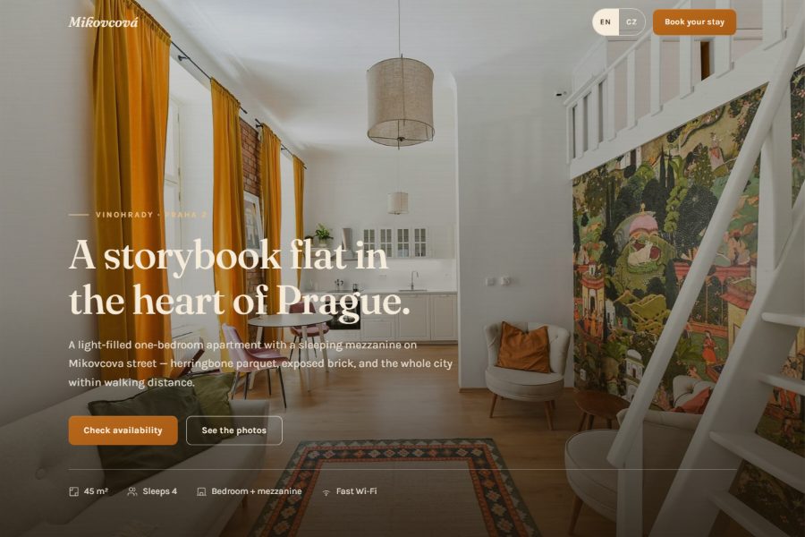 Screenshot of the Luxury Apartment Prague website — a storybook flat in Vinohrady with warm photography